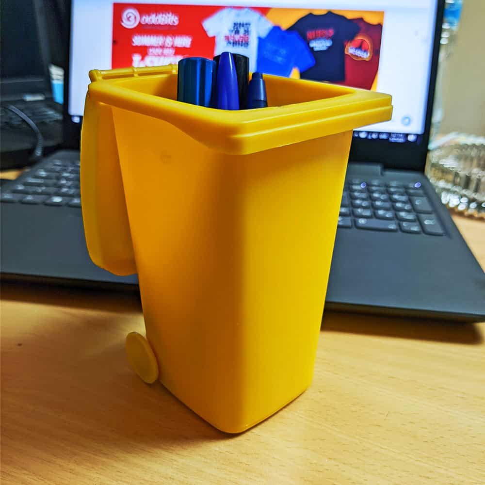 
                  
                    OddBits-Trash Bin with Lid Pen Holder "Yellow"
                  
                