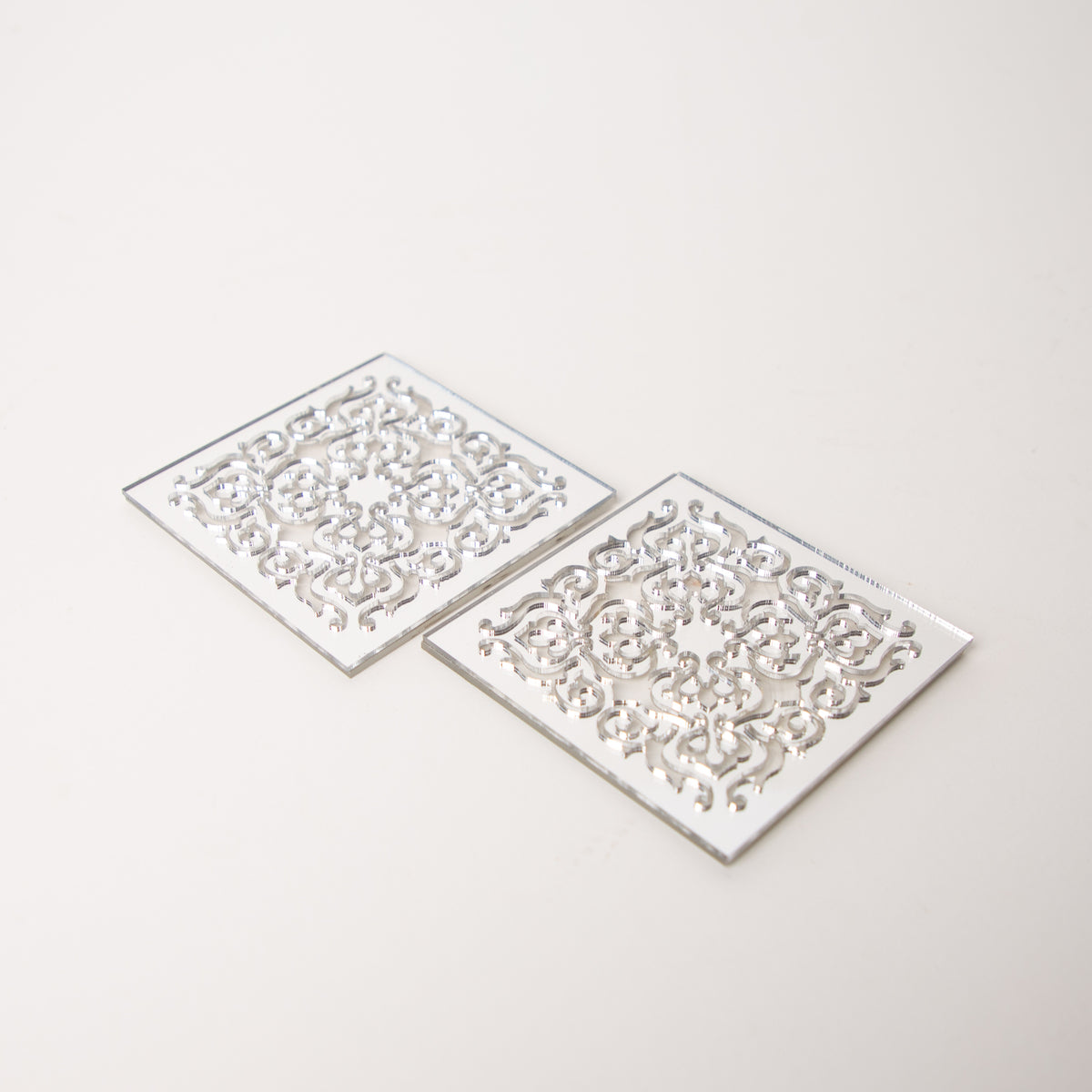 
                  
                    Zee Designs-Motif Silver Coasters
                  
                
